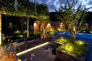 Outdoor Lighting System in a backyard with a pool
