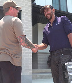 Blue Jay Irrigation Technician shaking hands with a Contractor